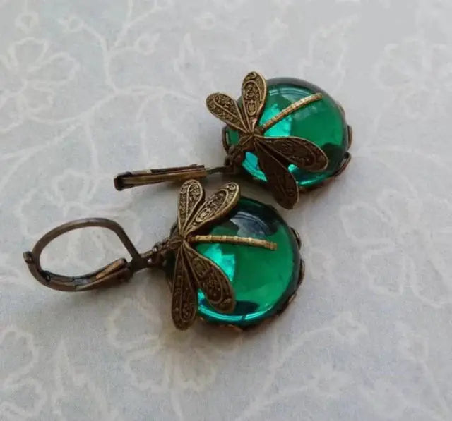 Spherical dragonfly earrings in antique golden
