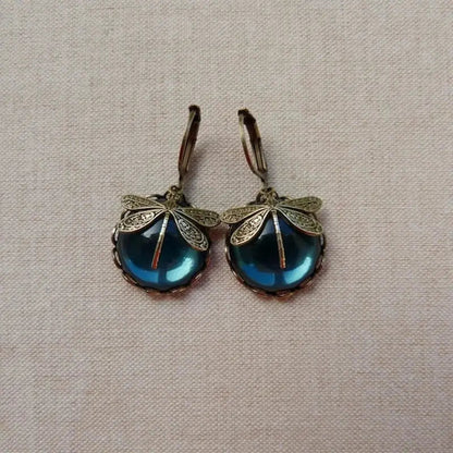 Spherical dragonfly earrings in antique golden