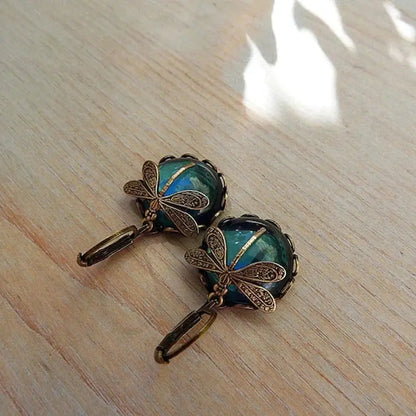 Spherical dragonfly earrings in antique golden