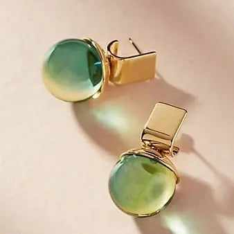Vintage earrings with green crystal
